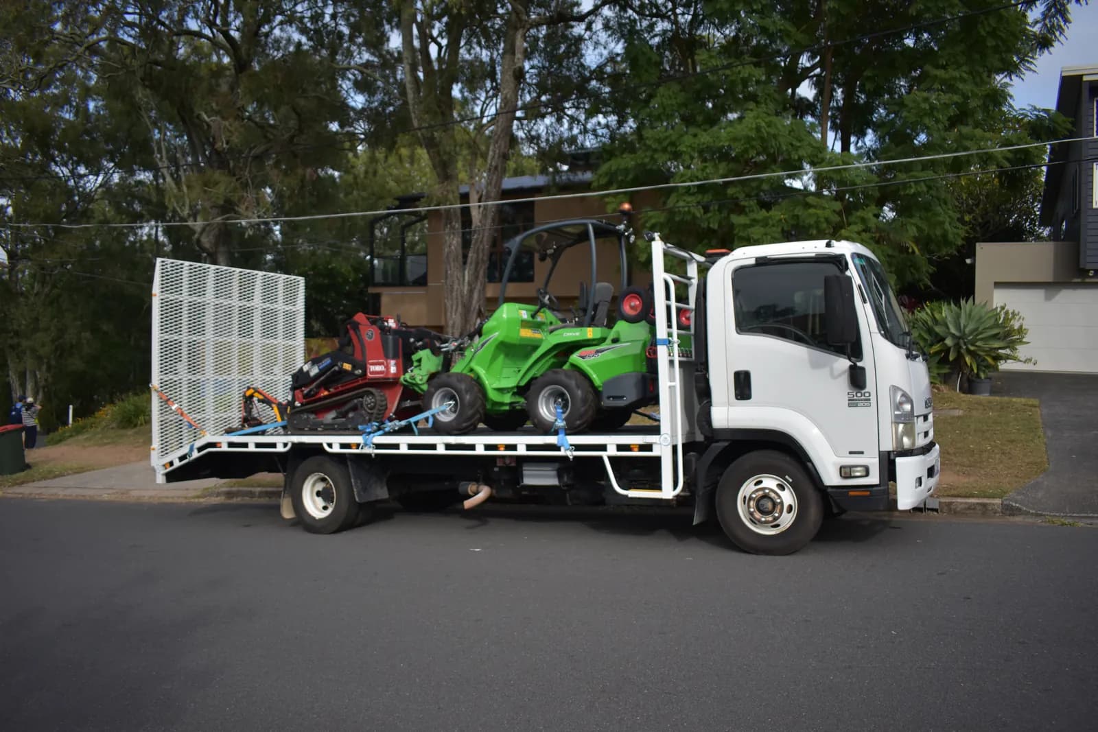 Mini loader loaded on the truck ready for the next job