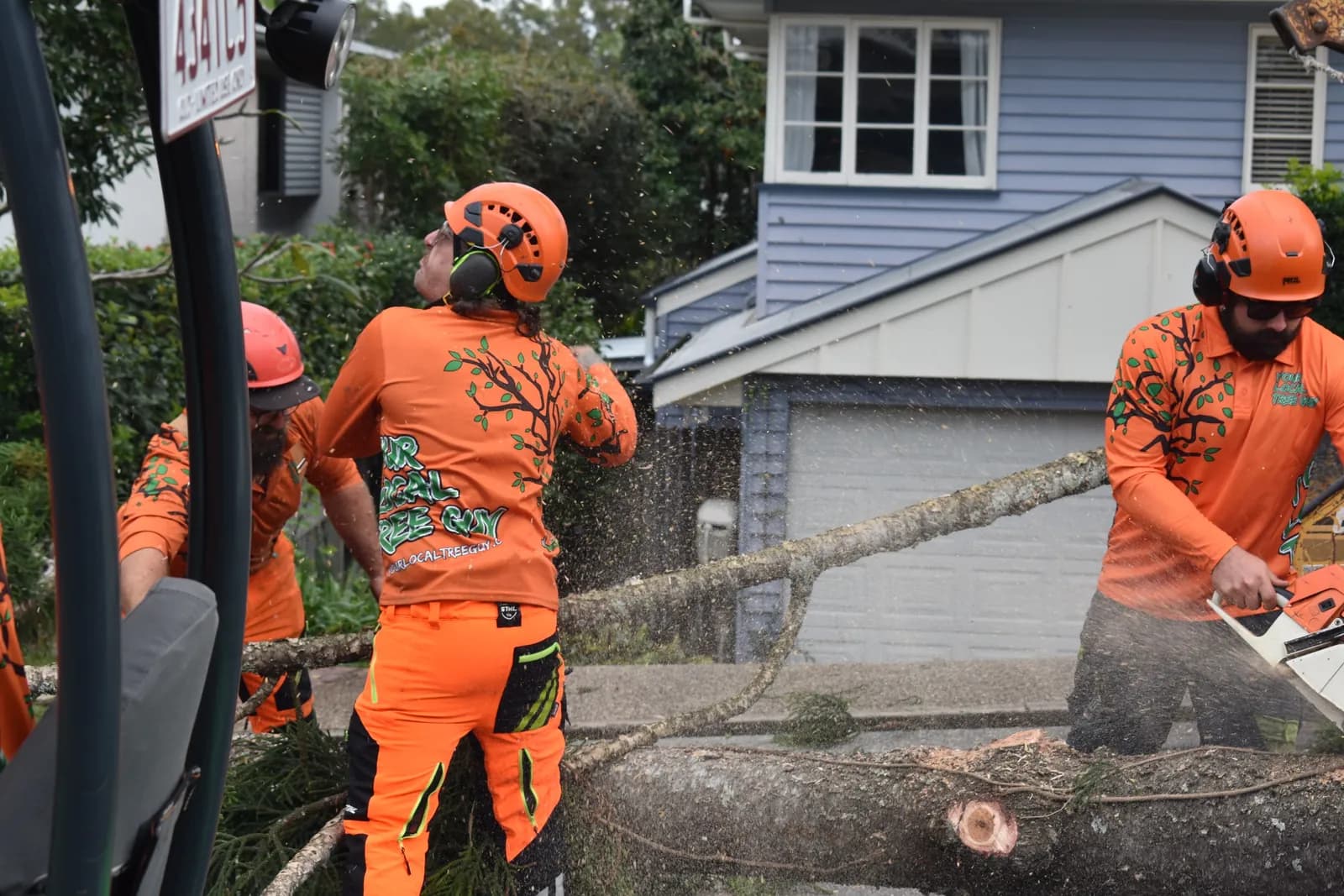 Cutting a heavy trunk into rounds for removal