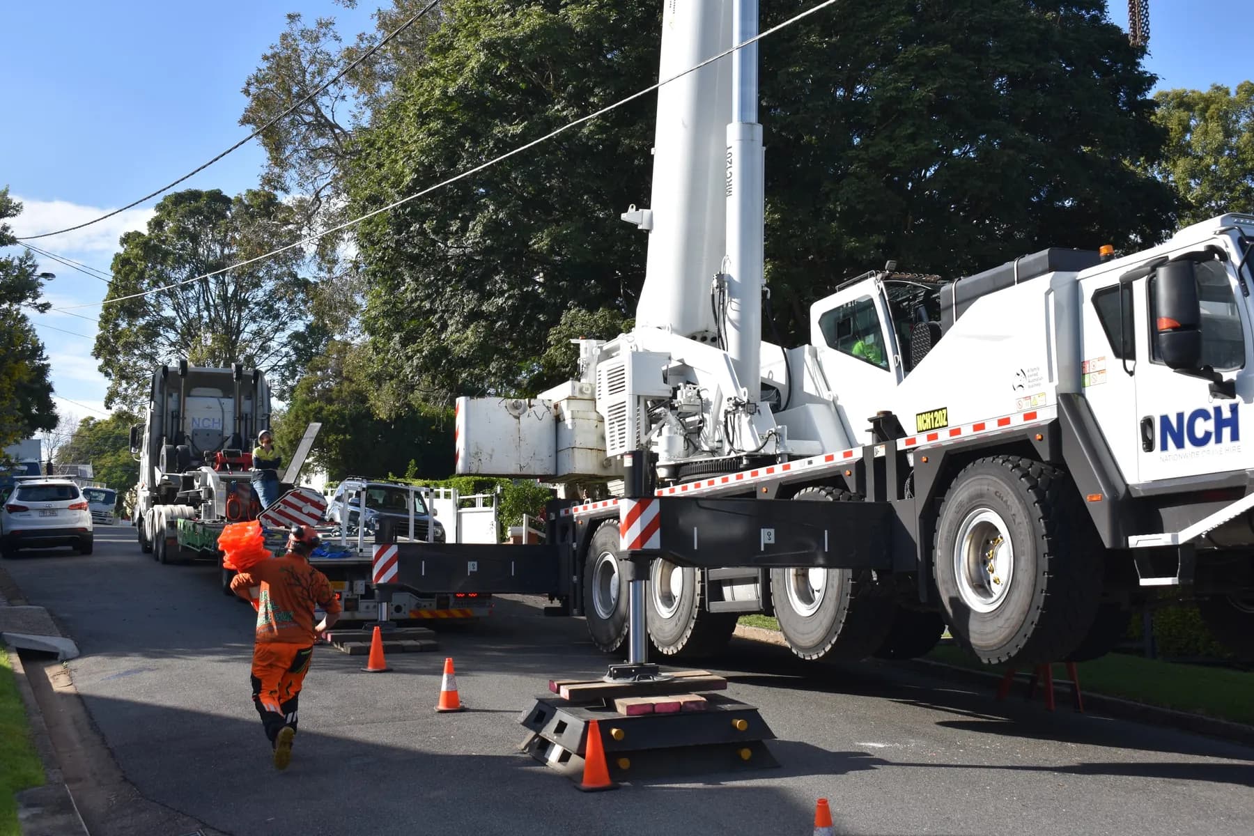 Crane set up on a Brisbane residential street for a large tree removal
